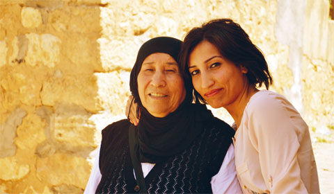 Sultani Ac ?buca avec sa fille. @ Amnesty International